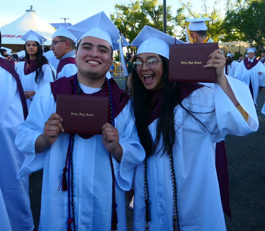LNESC Upward Bound graduates celebrating with their diplomas